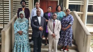 Front Row from left: Professors Shani Omari Mchepange, Nhlanhla Mkhize and William A.L. Anangisye Back Row from left: Prof Aldin Kaizilege Mutembei, Mr Edwell Dzomba, Dr Adventina Buberwa; Professor Nobuhle Hlongwa and Dr Phindile Dlamini. 